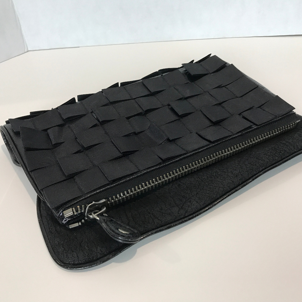 Rachel Roy ribbon trimmed black clutch